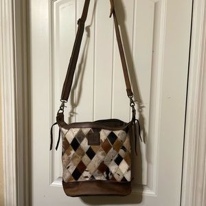 STS Ranchwear crossbody conceal carry with matching clutch.